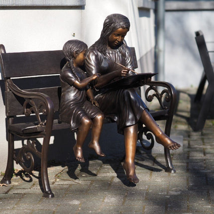 Bronzen beeld 2 tekenende zusjes op bankje 97x52x100cm - Doika - Bronzen beeld - Doika - 5410807015087 - B1508