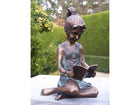 Bronzen beeld Klein lezend meisje 18x10x10cm - Doika - Bronzen beeld - Doika - 5410807008034 - AN0803BRW-V